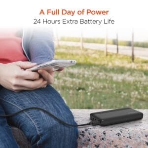 Traveler using HyperGear power bank outdoors